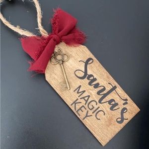 Santa’s Magic Key wooden keychain, comes with colored note explaining it.